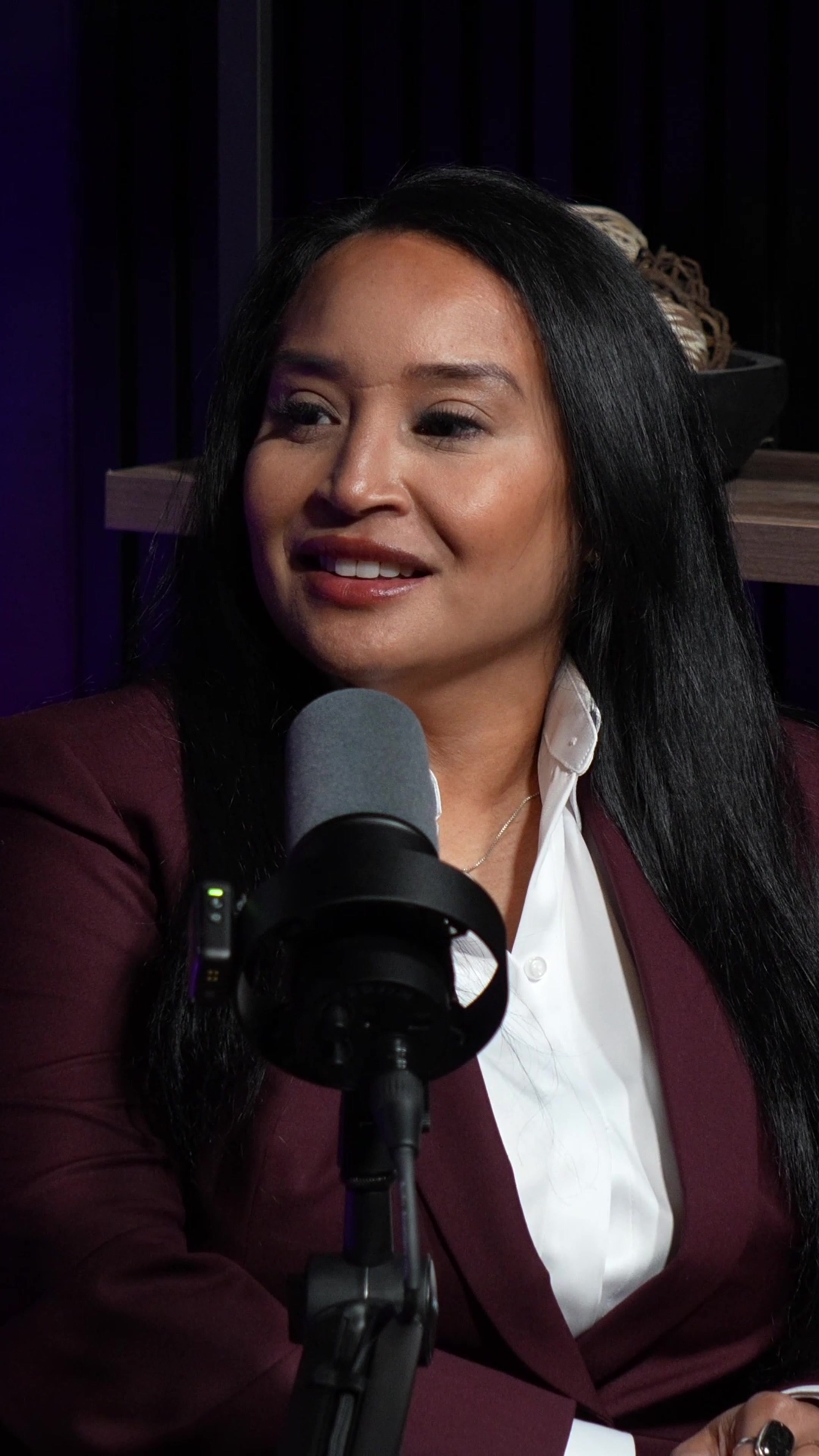 Caylene Salii speaking during a podcast interview